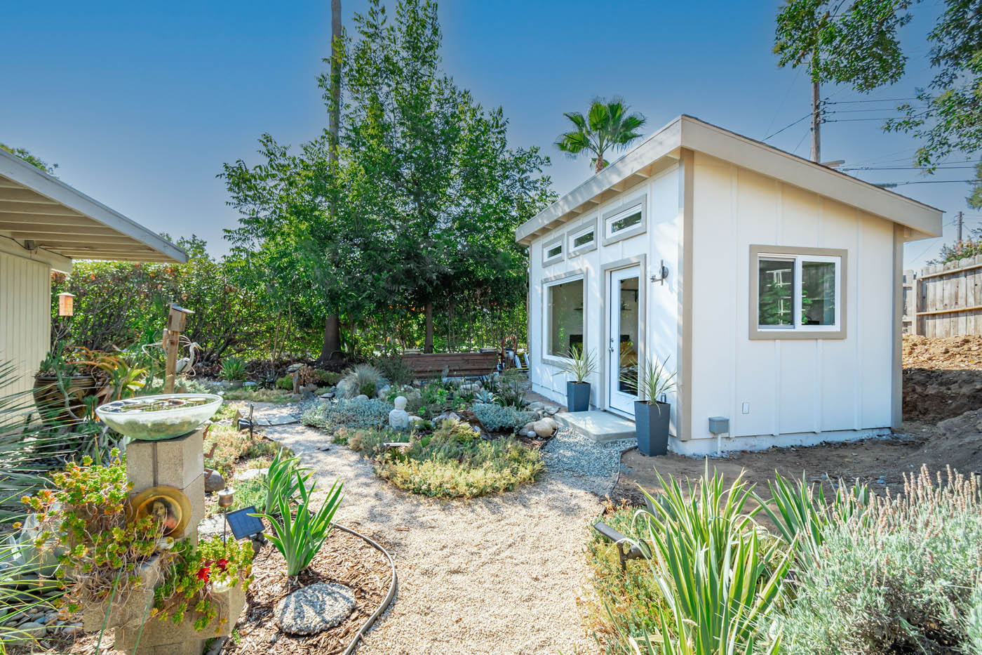 A modern white bathroom in a ADU home, provided by Anchored Tiny Homes in Collegeville / Quakertown.